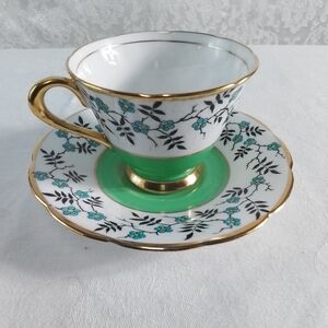 Tuscan English rare vintage raised floral teacup and saucer with gold trim